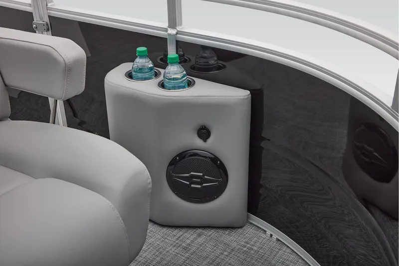 Slide: The Image of 2026 Sun Tracker SportFish 20 DLX interior with gray seating and steering wheel. - 7