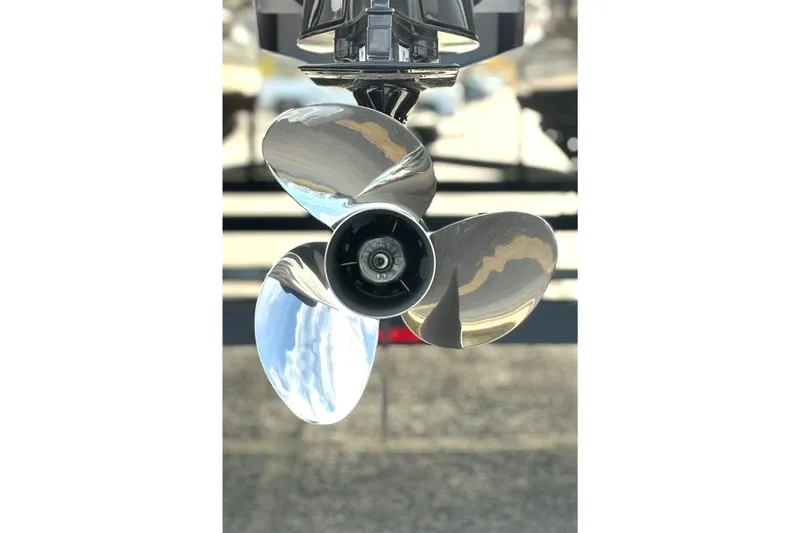 Slide: The Image of Close-up of a shiny boat propeller on a 2026 Sun Tracker Party Barge 22 RF DLX. - 15