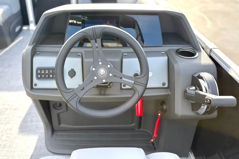 Slide: The Image of Steering console of 2026 Sun Tracker Party Barge 22 RF DLX pontoon boat. - 16