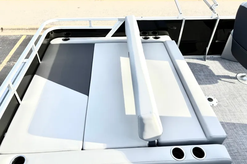 Slide: The Image of 2026 Sun Tracker Party Barge 22 RF DLX with spacious seating and cup holders. - 18