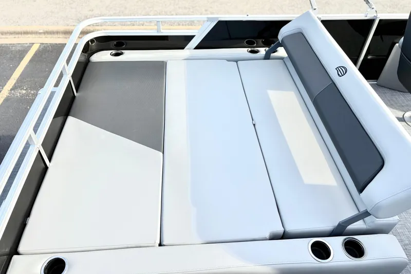 Slide: The Image of 2026 Sun Tracker Party Barge 22 RF DLX with spacious seating and cup holders. - 19