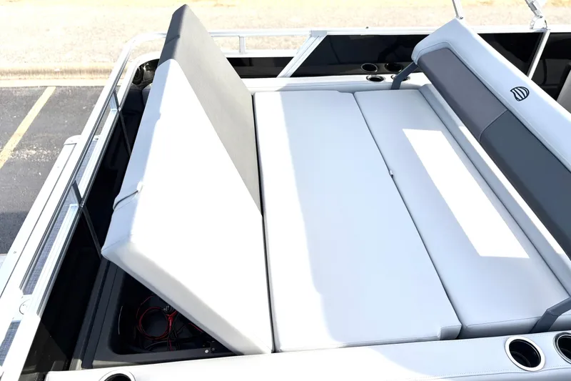 Slide: The Image of 2026 Sun Tracker Party Barge 22 RF DLX with adjustable seating and storage compartment. - 23