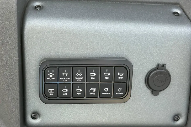 Slide: The Image of Control panel of 2026 Sun Tracker Party Barge 22 RF DLX with USB port. - 24