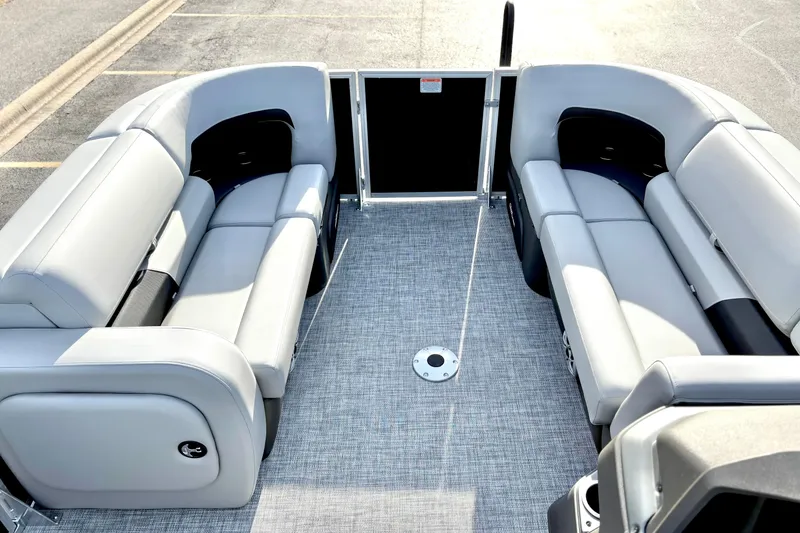 Slide: The Image of 2026 Sun Tracker Party Barge 22 RF DLX interior with spacious seating and modern design. - 30