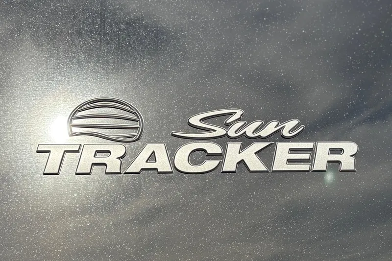 Slide: The Image of Sun Tracker logo on Party Barge 22 RF DLX, 2026 model, with metallic finish. - 9