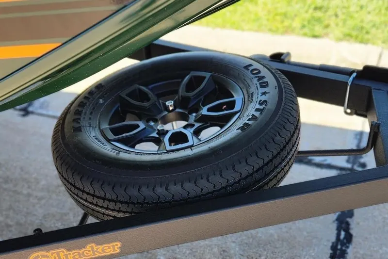 Slide: The Image of 2026 Tracker Bass Tracker Classic Limited trailer with Load Star tire and black alloy wheel. - 10