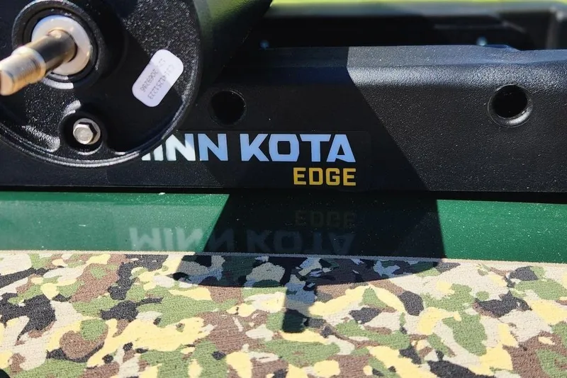Slide: The Image of Close-up of Minn Kota Edge motor on 2026 Tracker Bass Tracker Classic Limited boat. - 11