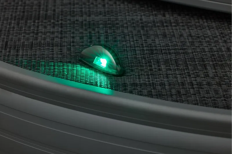 Slide: The Image of Sun Tracker SportFish 22 DLX 2026 logo on sleek boat exterior. - 16