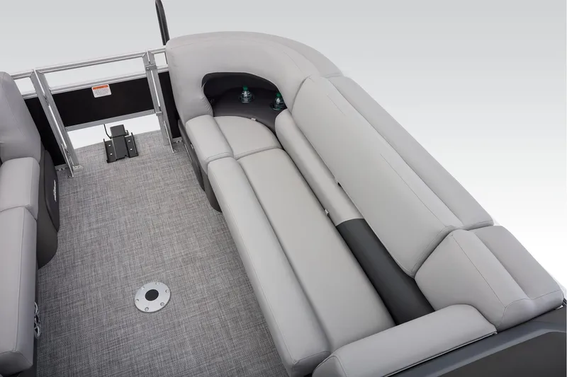 Slide: The Image of 2026 Sun Tracker SportFish 22 DLX boat interior with seating and control panel. - 28