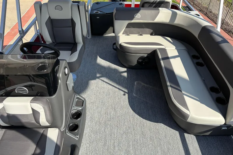 Slide: The Image of 2026 Sun Tracker Bass Buggy 18 DLX interior with spacious seating and modern design. - 4