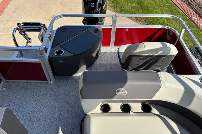 Slide: The Image of 2026 Sun Tracker Bass Buggy 18 DLX interior with seating and storage features. - 5