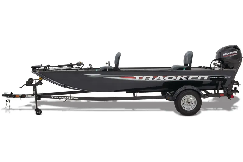 The Image of 2026 Tracker Panfish 17 boat on trailer, parked outside dealership. - 1