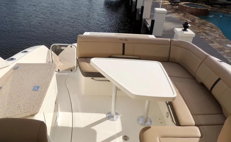 Slide: The Image of 2016 Sea Ray 350 Sundancer yacht with spacious seating and sleek design. - 31
