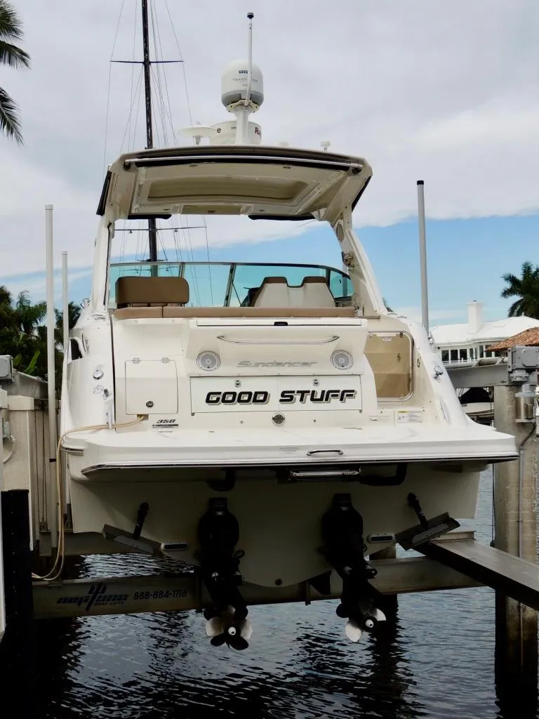 Slide: The Image of 2016 Sea Ray 350 Sundancer yacht docked in a scenic canal setting. - 4