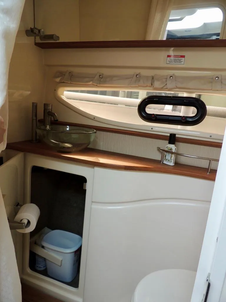 Slide: The Image of Control panel of a 2016 Sea Ray 350 Sundancer boat. - 44