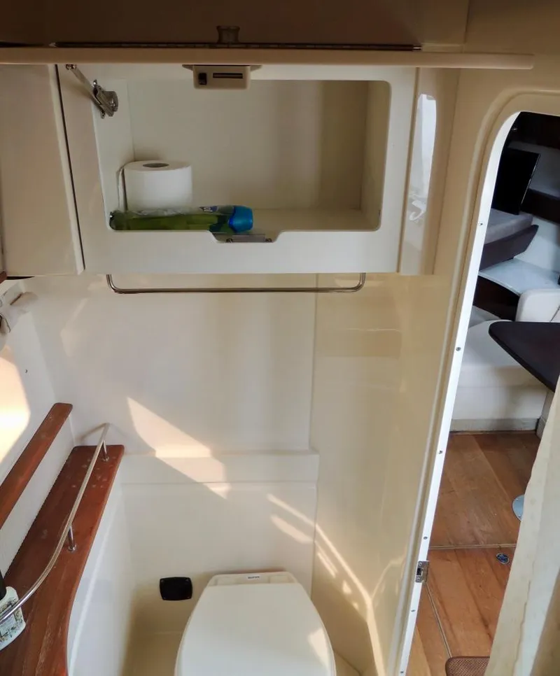 Slide: The Image of Luxurious bathroom interior of 2016 Sea Ray 350 Sundancer yacht with glass sink. - 46
