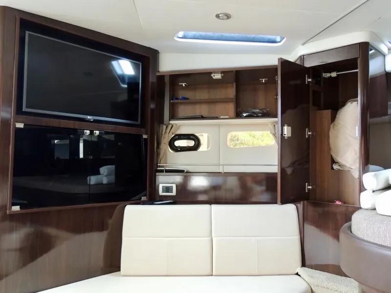 Slide: The Image of Interior of 2016 Sea Ray 350 Sundancer with glass sink and window view. - 47