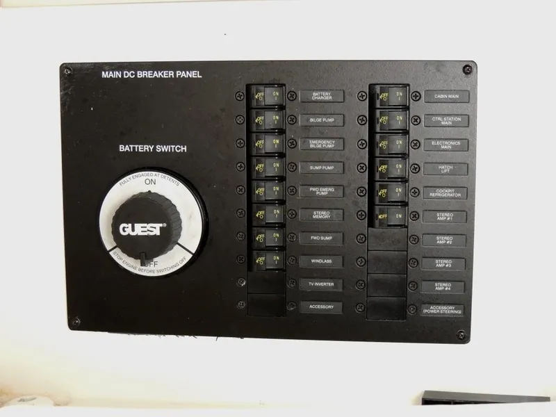 Slide: The Image of Main DC breaker panel on a 2016 Sea Ray 350 Sundancer boat. - 57