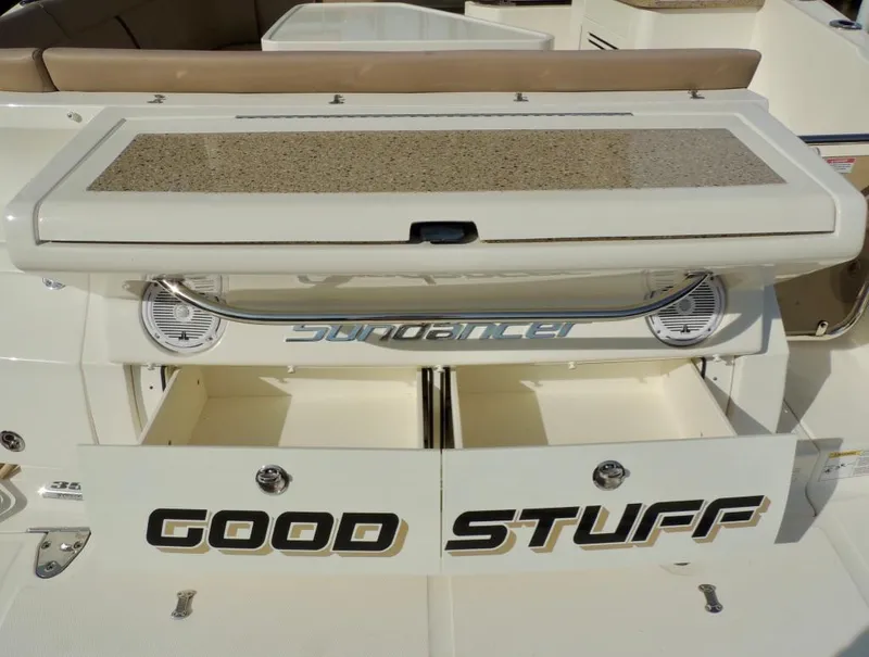 Slide: The Image of 2016 Sea Ray 350 Sundancer boat with Good Stuff text on the back. - 65