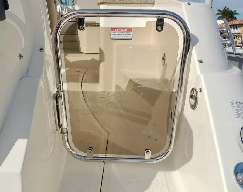 Slide: The Image of 2016 Sea Ray 350 Sundancer cabin door with stainless steel frame. - 66