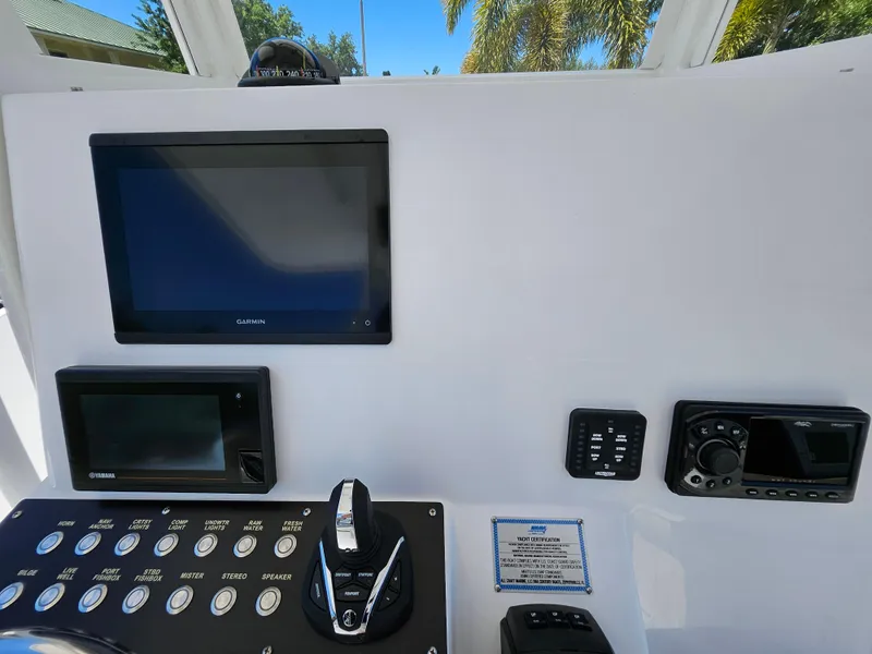 Slide: The Image of Century 2900 Center Console 2022 dashboard with navigation screens and controls. - 12