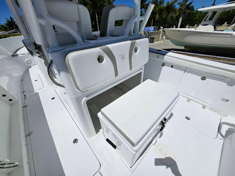 Slide: The Image of 2022 Century 2900 Center Console boat interior with seating and storage. - 20