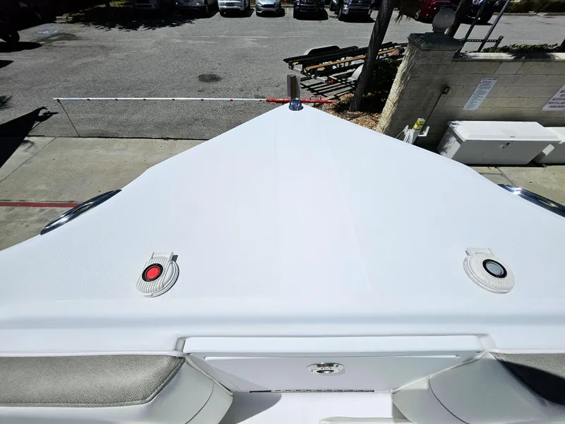 Slide: The Image of 2022 Century 2900 Center Console boat, top view of bow area in a parking lot. - 34