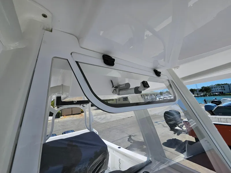 Slide: The Image of 2022 Century 2900 Center Console boat interior with open storage compartment. - 35