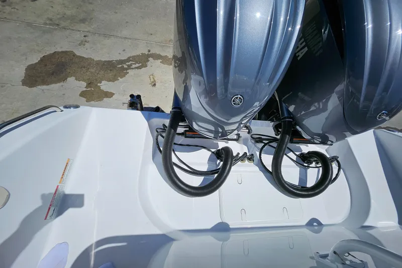 Slide: The Image of 2022 Century 2900 Center Console boat with dual outboard motors. - 48