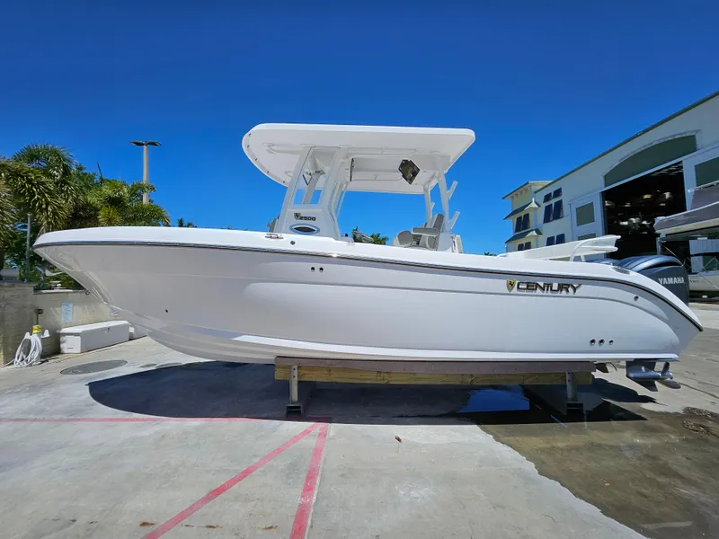 Slide: The Image of 2022 Century 2900 Center Console boat displayed outdoors on a sunny day. - 5