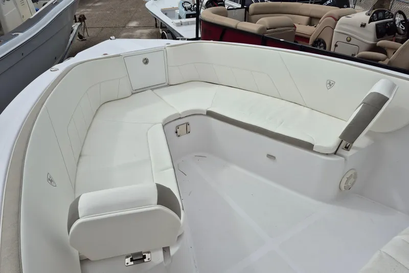 Slide: The Image of 2022 Century 2900 Center Console boat with spacious white seating area. - 62