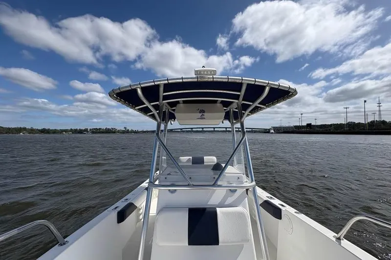 Slide: The Image of Edgewater 225CC boat on water under a partly cloudy sky, 2001 model. - 20