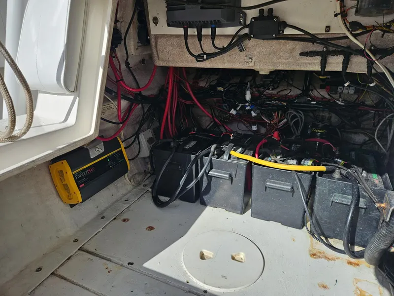 Slide: The Image of Electrical system and batteries inside a 2005 Intrepid 323 Cuddy boat. - 20