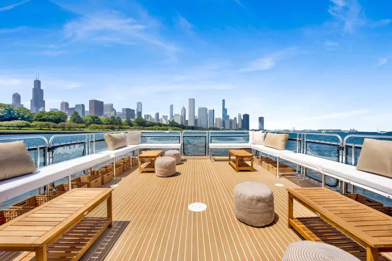Slide: The Image of Luxurious A&M Manufacturing COI yacht deck with city skyline view, 2026 model. - 3