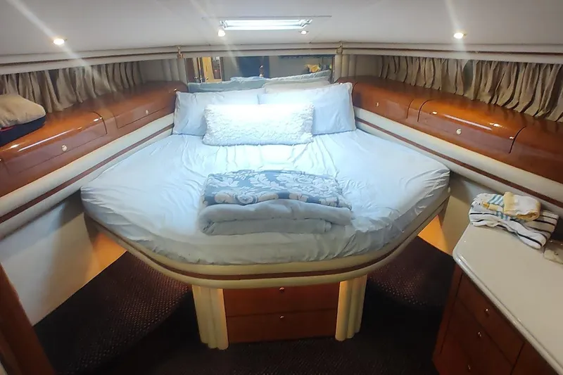 Slide: The Image of Stainless steel appliances in 2001 Sea Ray 560 Sedan Bridge yacht kitchen. - 24