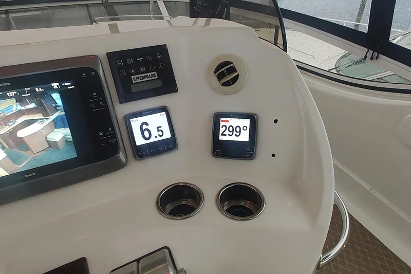 Slide: The Image of Washing machine inside 2001 Sea Ray 560 Sedan Bridge yacht's wooden cabinet. - 33