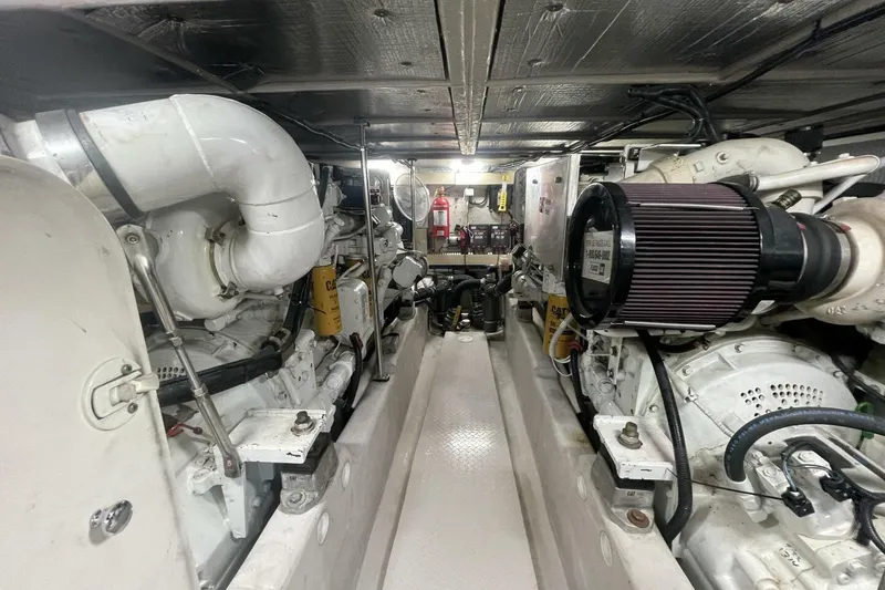 Slide: The Image of Control panel of a 2001 Sea Ray 560 Sedan Bridge yacht with switches. - 43