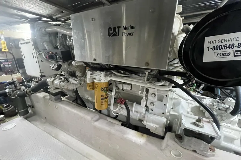 Slide: The Image of Engine room of 2001 Sea Ray 560 Sedan Bridge with CAT Marine Power engine. - 53