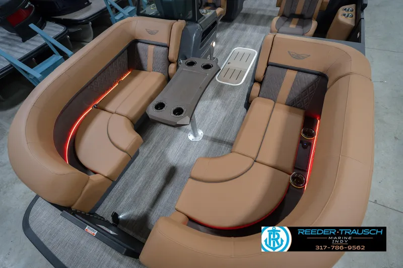 Slide: The Image of Luxurious interior of 2026 Bennington 22 MFB boat with plush seating and ambient lighting. - 12