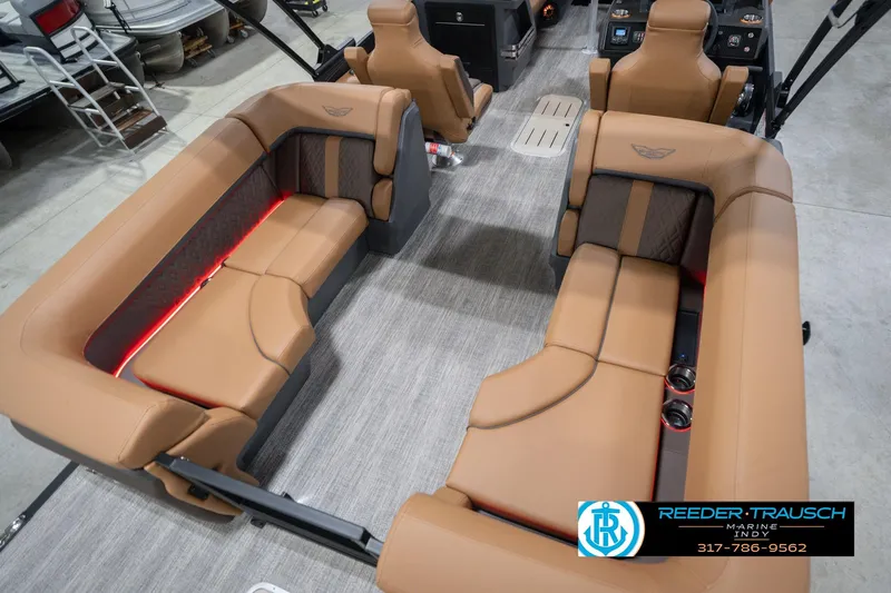 Slide: The Image of 2026 Bennington 22 MFB boat interior with tan seating and modern design. - 14