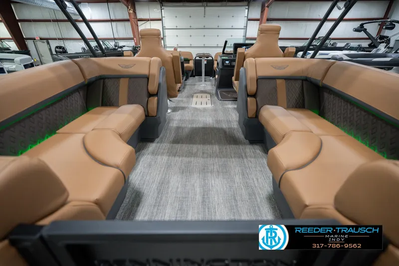 Slide: The Image of Luxurious interior of 2026 Bennington 22 MFB boat with tan seating and modern design. - 19