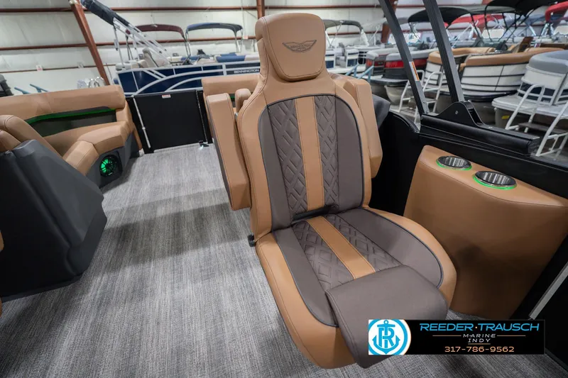 Slide: The Image of 2026 Bennington 22 MFB boat interior with luxurious seating and cup holders. - 28