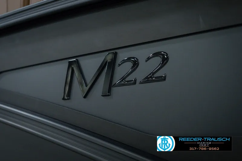 Slide: The Image of 2026 Bennington 22 MFB boat model emblem with Reeder Trausch Marine logo. - 55