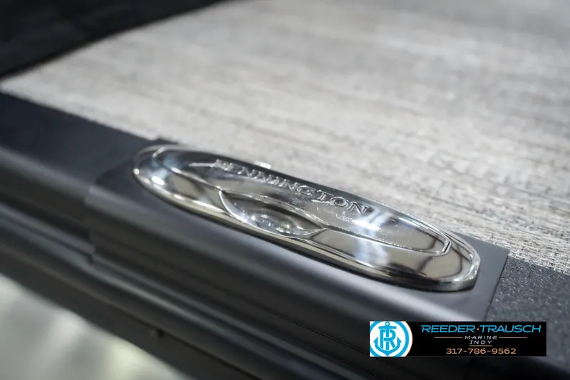 Slide: The Image of Close-up of 2026 Bennington 22 MFB boat emblem on textured surface. - 59