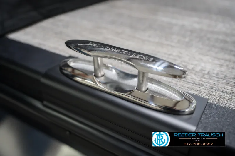 Slide: The Image of 2026 Bennington 22 MFB boat cleat detail with Reeder-Trausch Marine logo. - 60