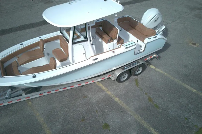 Slide: The Image of 2026 Sea Hunt Ultra 255 SE boat on trailer, aerial view. - 8