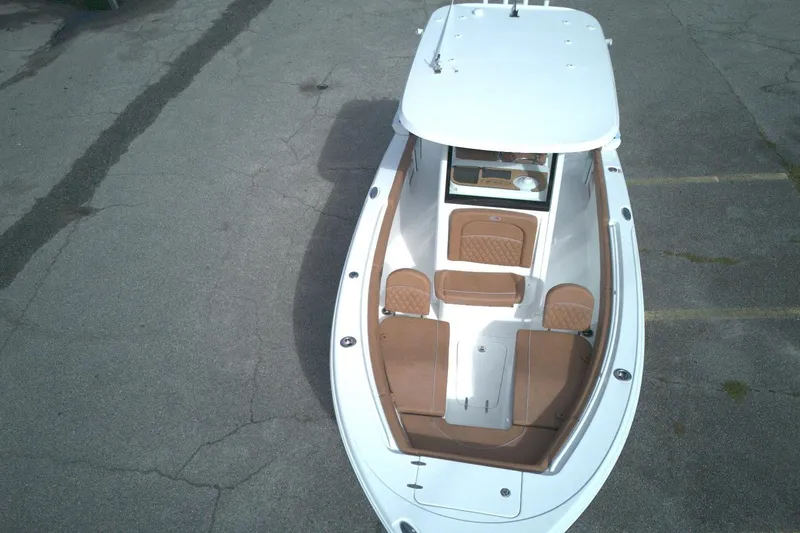 Slide: The Image of 2026 Sea Hunt Ultra 255 SE boat with spacious seating and sleek design. - 9