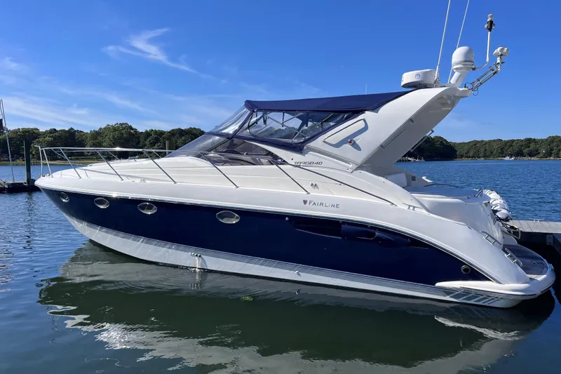 The Image of 2006 Fairline Targa 40 yacht docked on a sunny day, showcasing sleek design. - 0