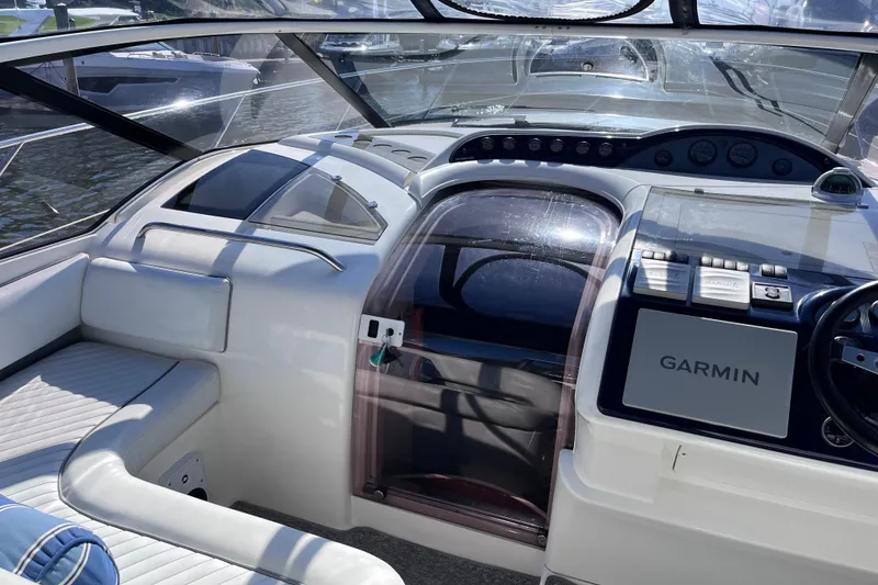 Slide: The Image of 2006 Fairline Targa 40 yacht cockpit with Garmin navigation system and luxurious seating. - 13
