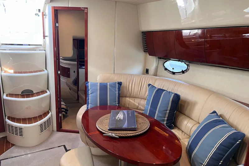 Slide: The Image of Interior of 2006 Fairline Targa 40 yacht with elegant seating and wooden accents. - 21